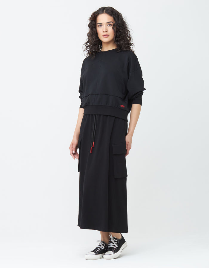 Jersey Skirt with Elastic Drawstring Waist and Cargo Pockets worn with matching Black Jersey Kangaroo Pocket Sweatshirt