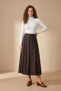 Brown plaid belted pleated maxi skirt with structured waistband and pleated panels