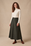 Dark green A-line maxi skirt, mid-to-full length flare from waist.