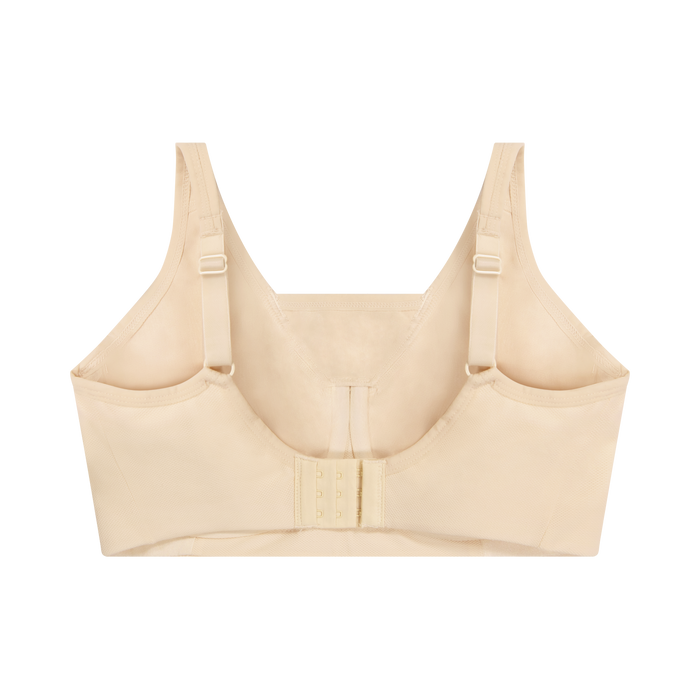 Nude cotton sports bra with adjustable straps and supportive underband panel