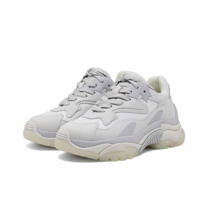 Women’s leather low-top sneakers pair, off-white with lace-up design and chunky sole