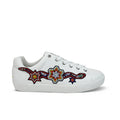 Women’s white leather sneakers with multicolor star appliqué and lace-up front