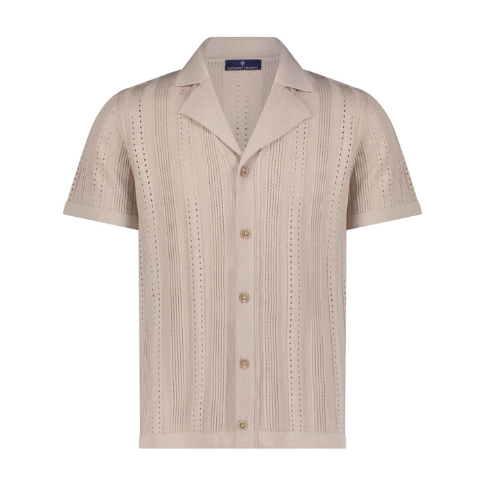 Beige short-sleeve shirt with button details on a white background