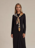 Black button-front maxi dress with plaid scarf tie and long sleeves