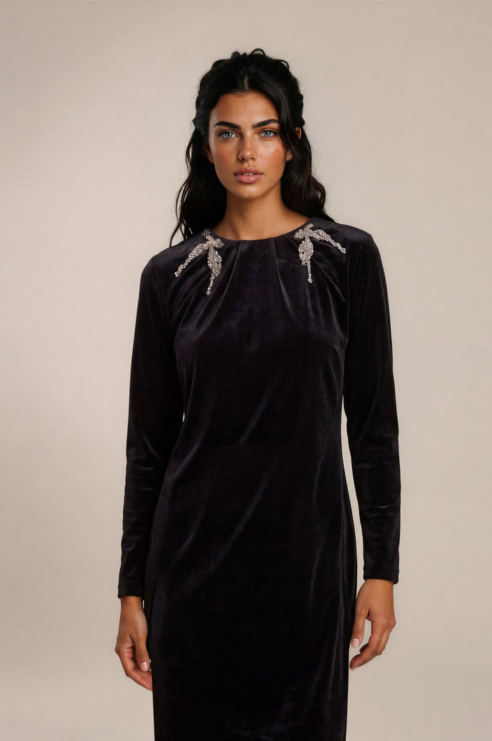 Black velvet maxi dress with long sleeves and crystal shoulder embellishments, crew neck