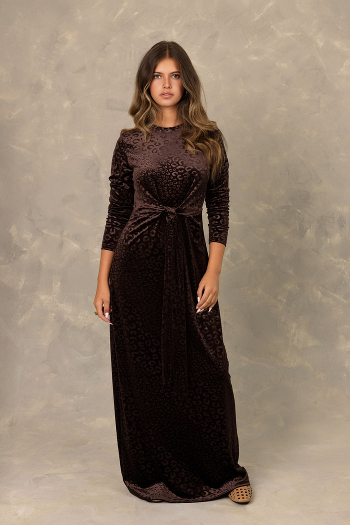 Brown textured velvet long sleeve maxi dress with front knot detail.