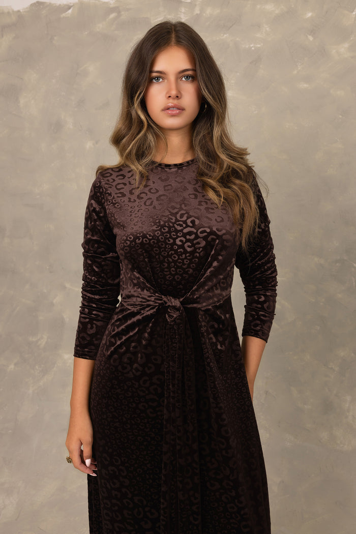 Brown textured velvet long sleeve maxi dress with front knot detail.