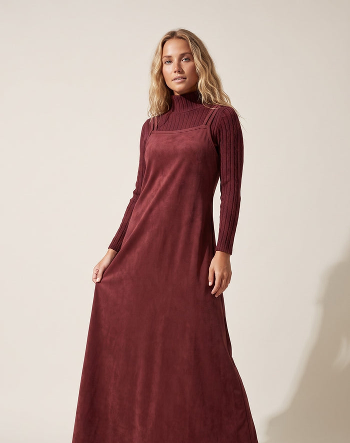 Burgundy suede maxi jumper dress, sleeved turtleneck sweater bodice and side drape