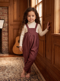 Burgundy tweed baby romper with button straps and pocket.