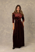 Burgundy velvet long sleeve maxi dress with front knot detail.