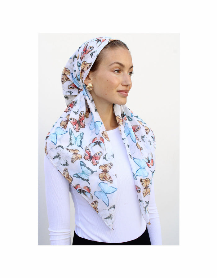 Pre-tied headscarf in light blue and white with multicolor butterfly pattern