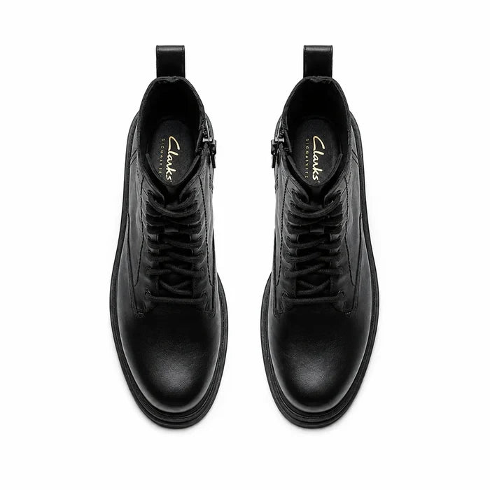 Pair of women's black leather lace-up ankle boots, front view