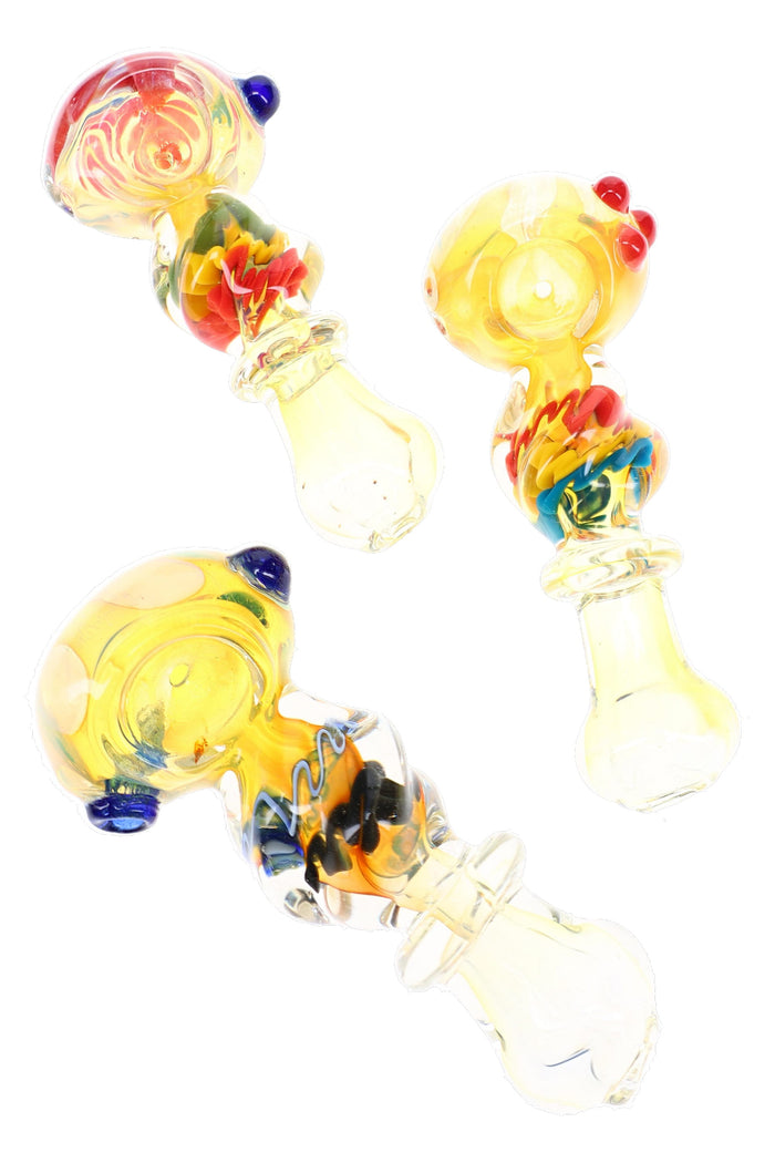 Assorted twisted squiggle spoon pipes with pale yellow glass, colorful ribbons, and raised marbles