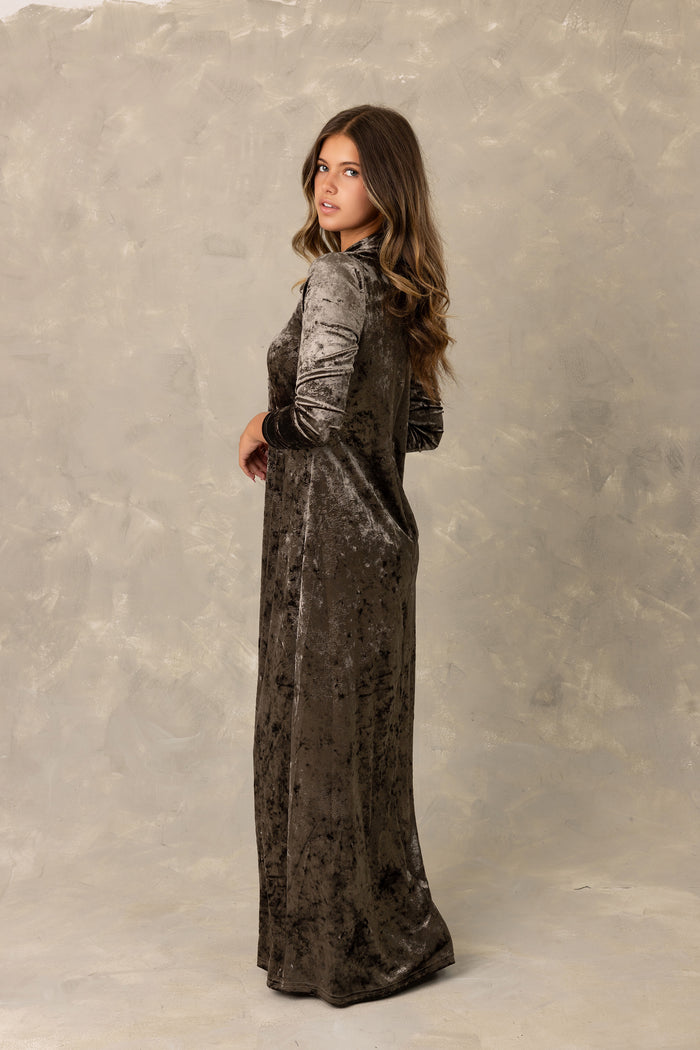 Long sleeve copper crushed velvet tie neck maxi dress.