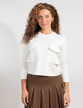 Cropped ivory long-sleeve top with two flap chest pockets