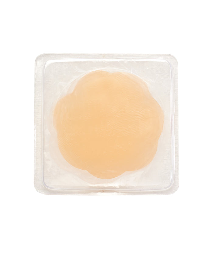 Nude silicone gel petal round pad in clear plastic case