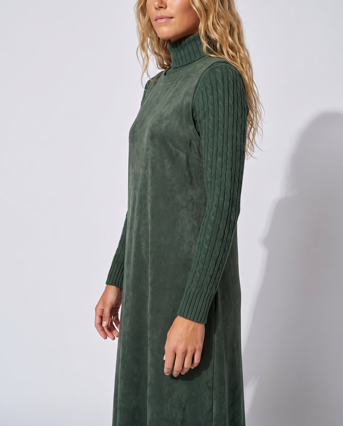 Forest green suede maxi dress side view with high neck and ribbed long sleeves