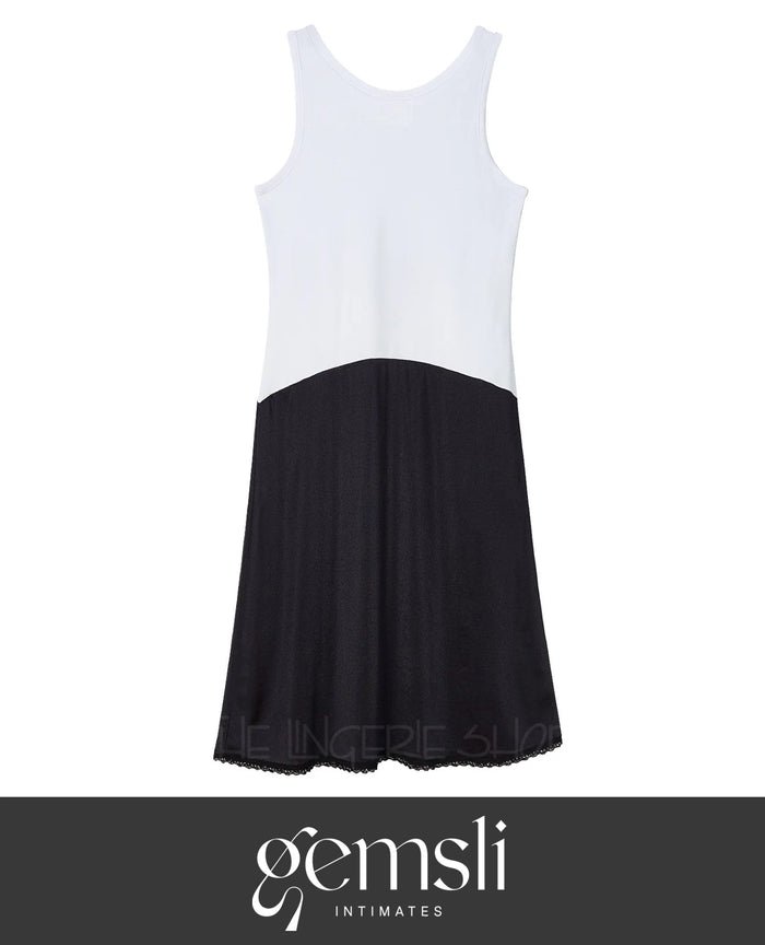 Reversible full slip with wide scoop neck, black lower panel, white upper, lace hem