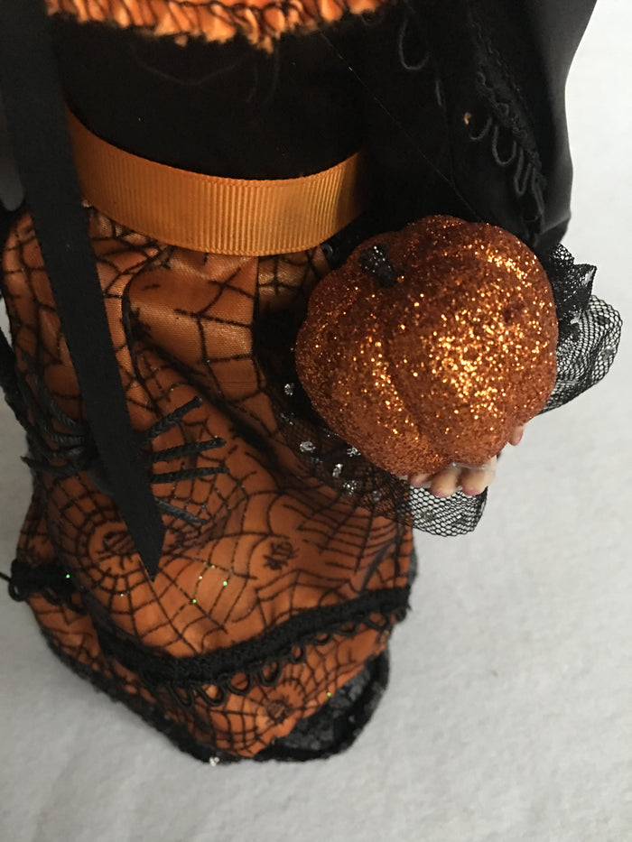 Halloween Black and Orange Witch Holding Pumpkin and Broom