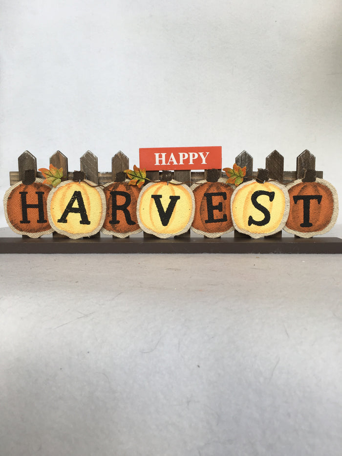 Harvest Orange and Yellow Pumpkins Against Picket Fence Block Sitter