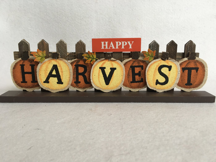 Harvest Orange and Yellow Pumpkins Against Picket Fence Block Sitter
