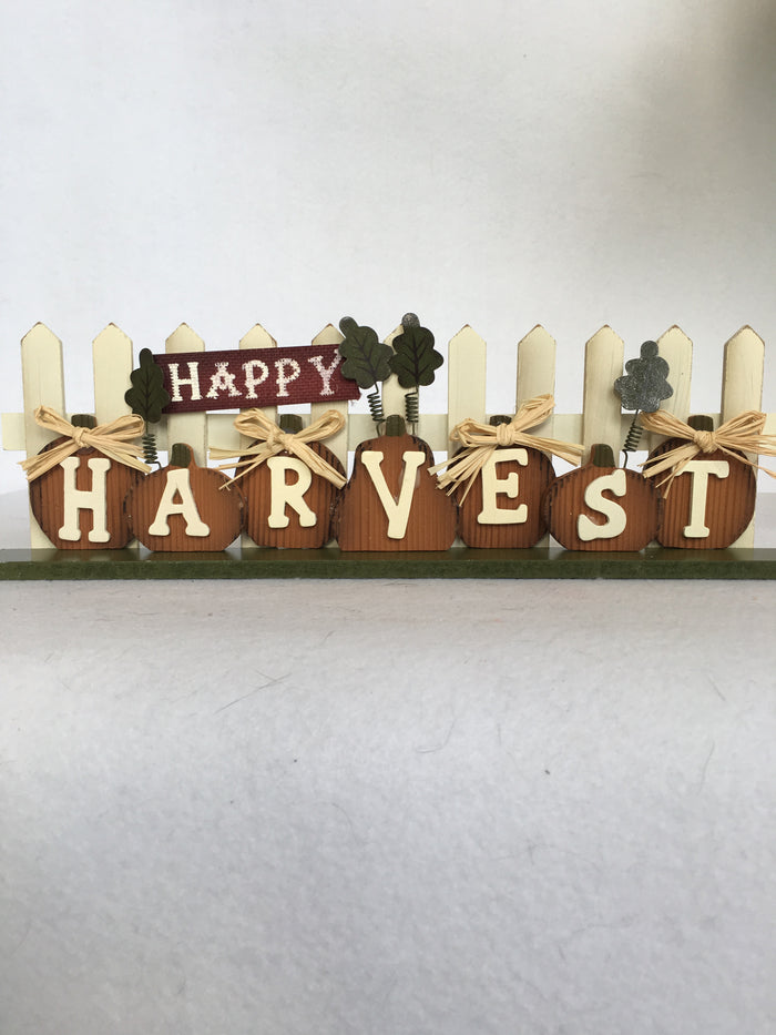 Harvest Pumpkins Against Picket Fence Block Sitter