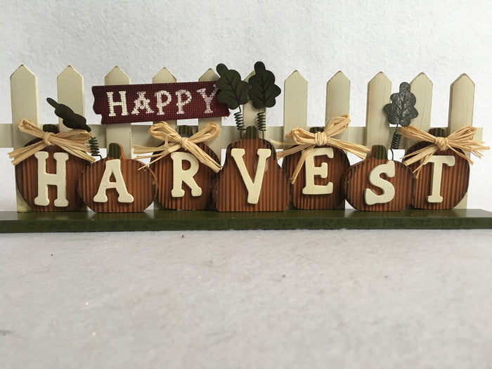 Harvest Pumpkins Against Picket Fence Block Sitter