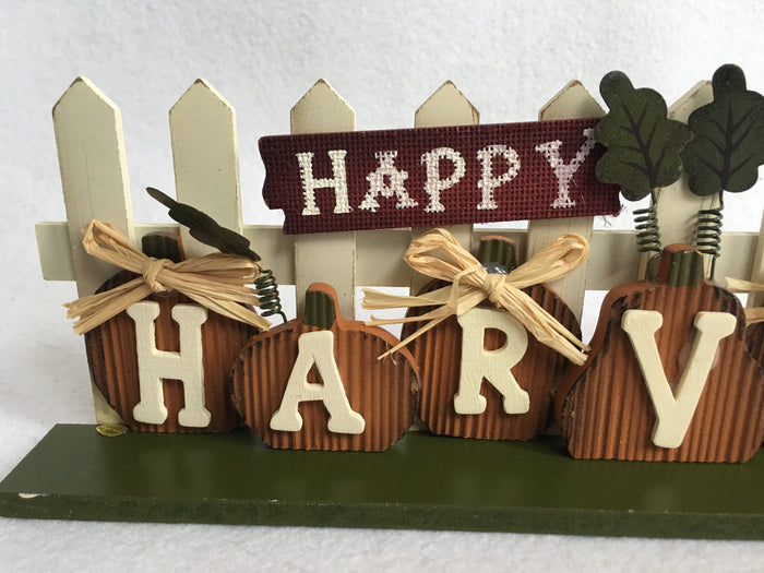 Harvest Pumpkins Against Picket Fence Block Sitter