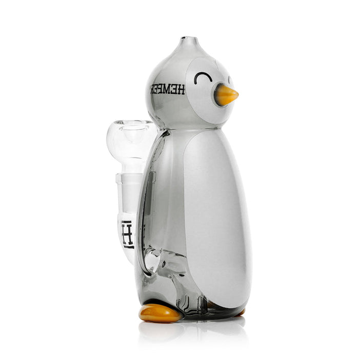 Side profile of Hemper penguin novelty glass bong with curved wings, yellow beak mouthpiece and clear bowl joint for smooth filtered herb hits.