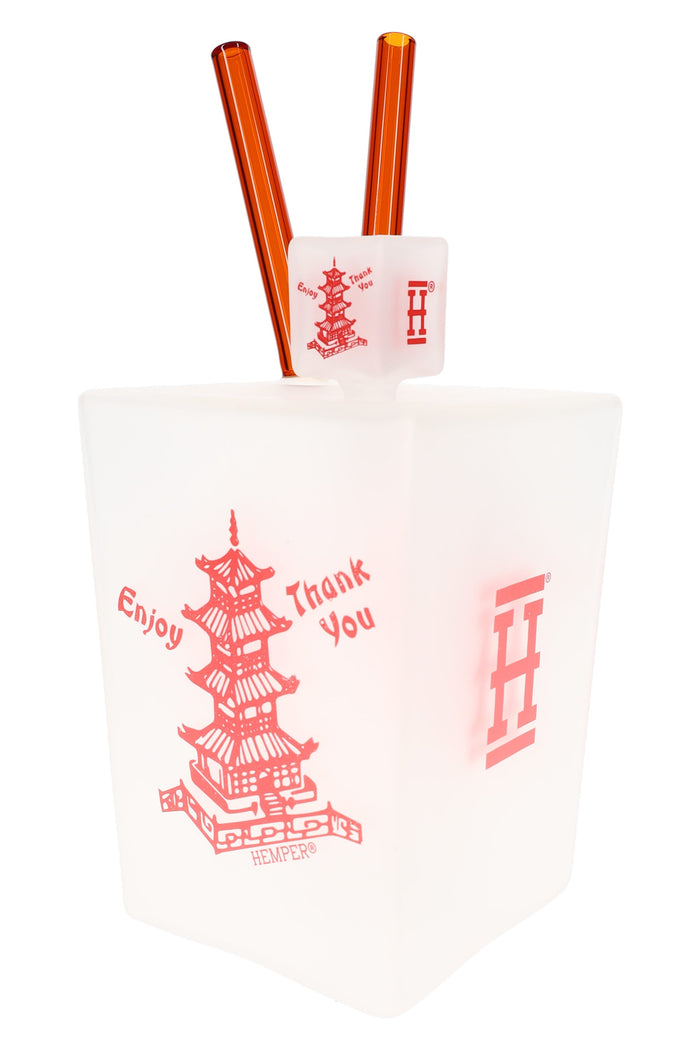 9-inch Hemper Chinese Takeout Box XL frosted white glass bong with red pagoda art and amber chopsticks mouthpiece, angled on white.