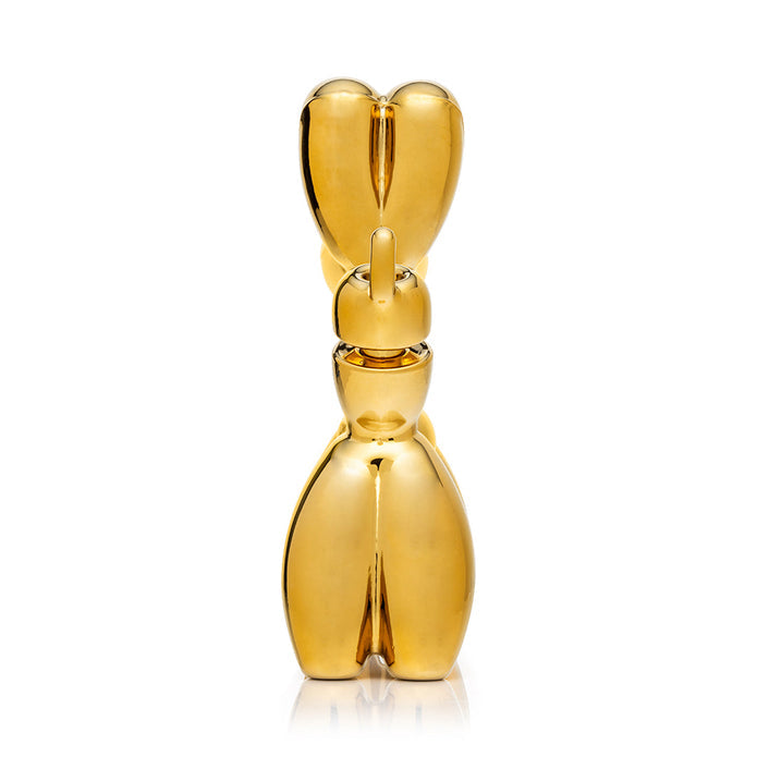 Rear view gold balloon dog bong showing centered tail joint area and standing base, glossy gold display piece