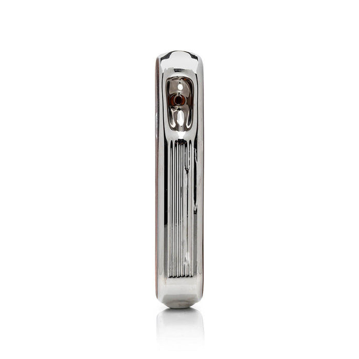 Side profile of metallic army knife style glass hand pipe highlighting ridged trim and recessed bowl on the top panel.