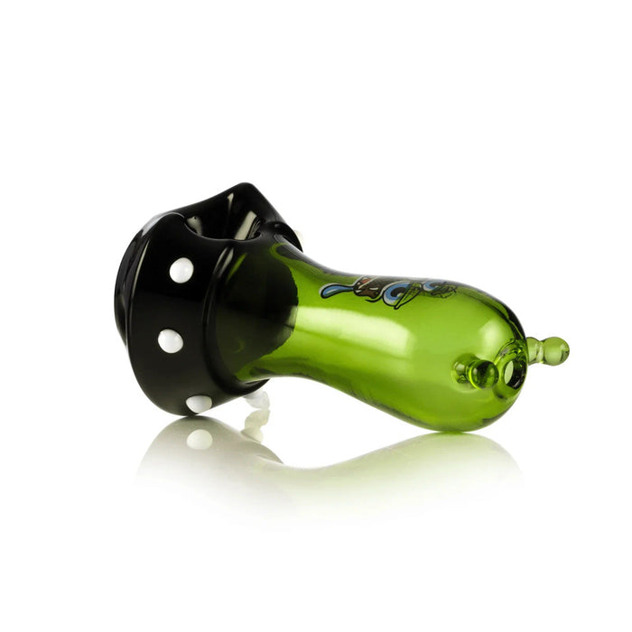 Side view of Space Monster glass hand pipe with green body, black base, and small mouthpiece end