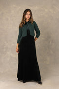 Hunter green velvet maxi dress with neck  tie bow and knit cardigan.