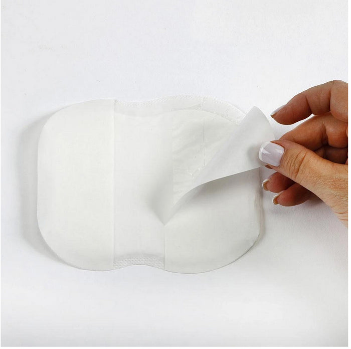Disposable underarm sweat pads, white adhesive backing shown being peeled