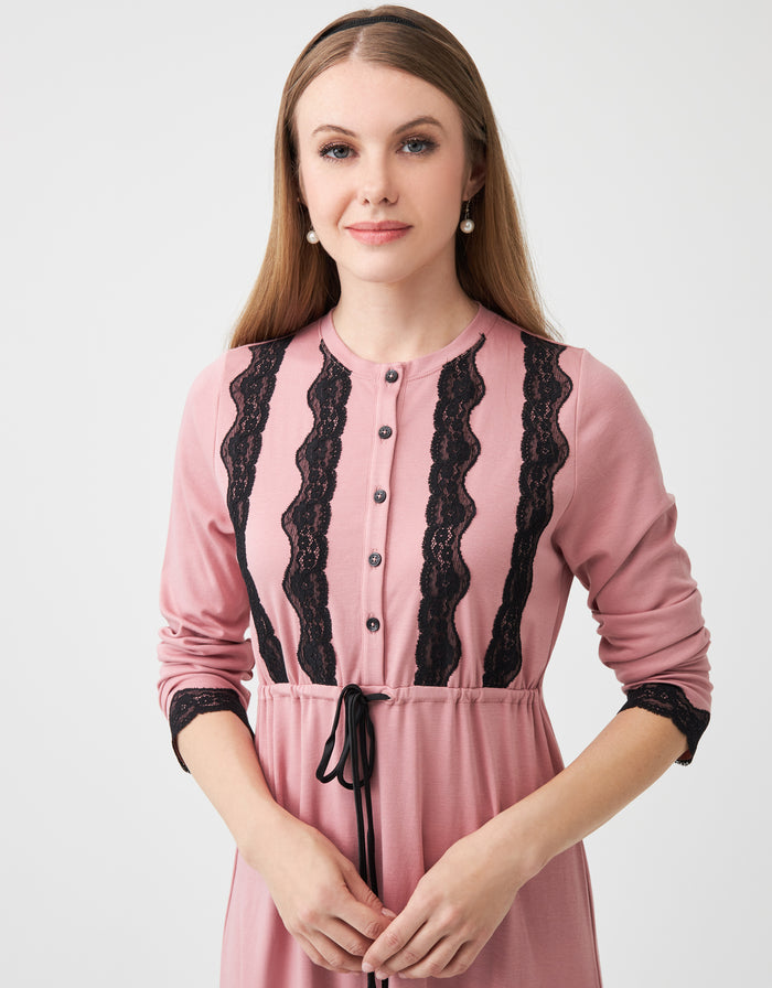 Pink button front nightgown with black lace vertical trim, drawstring waist, long sleeves