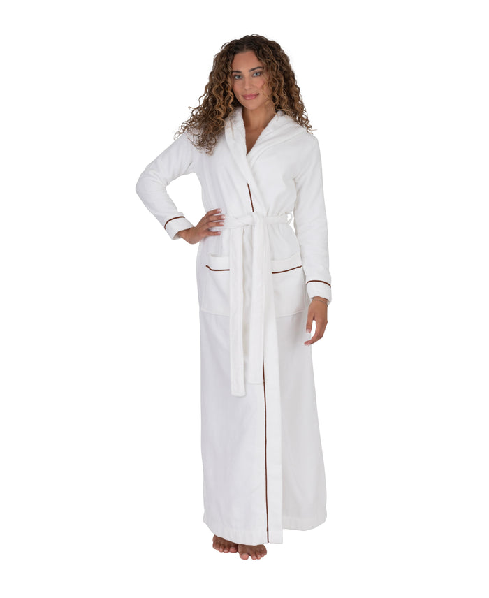 Long white terry bathrobe with hood, belted waist and brown piped trim