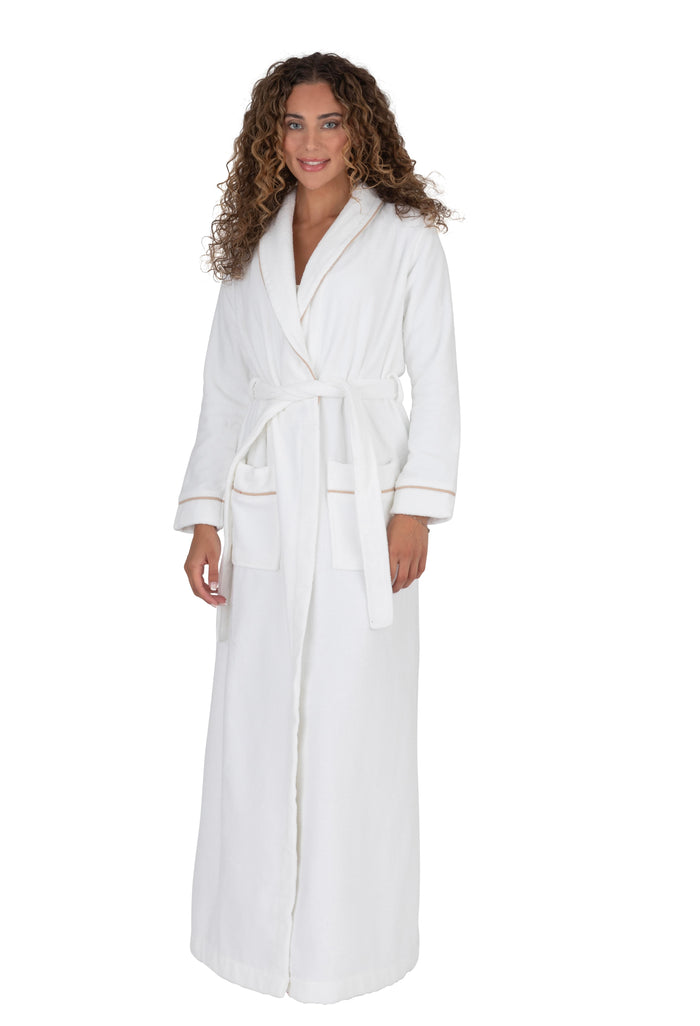 Long white terry wrap bathrobe with shawl collar, tie belt, and brown piped trim