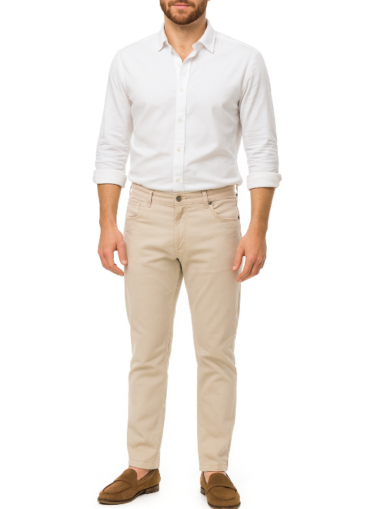 Man wearing a white shirt and beige pants on a white background
