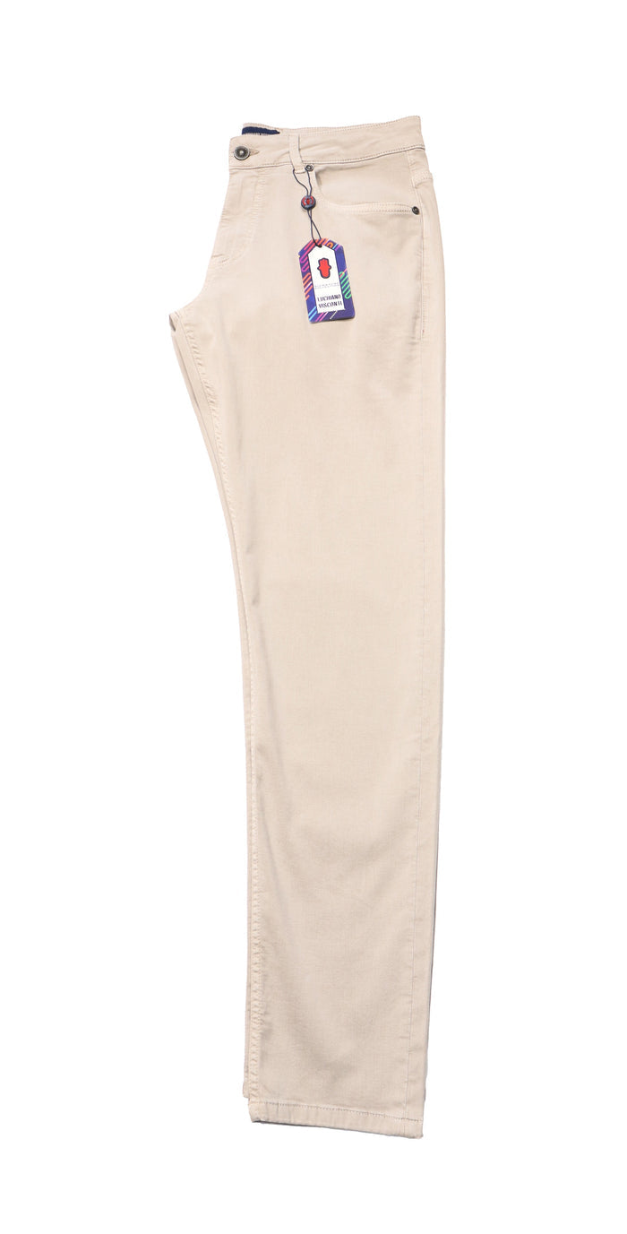 Beige pants with a tag on a white background