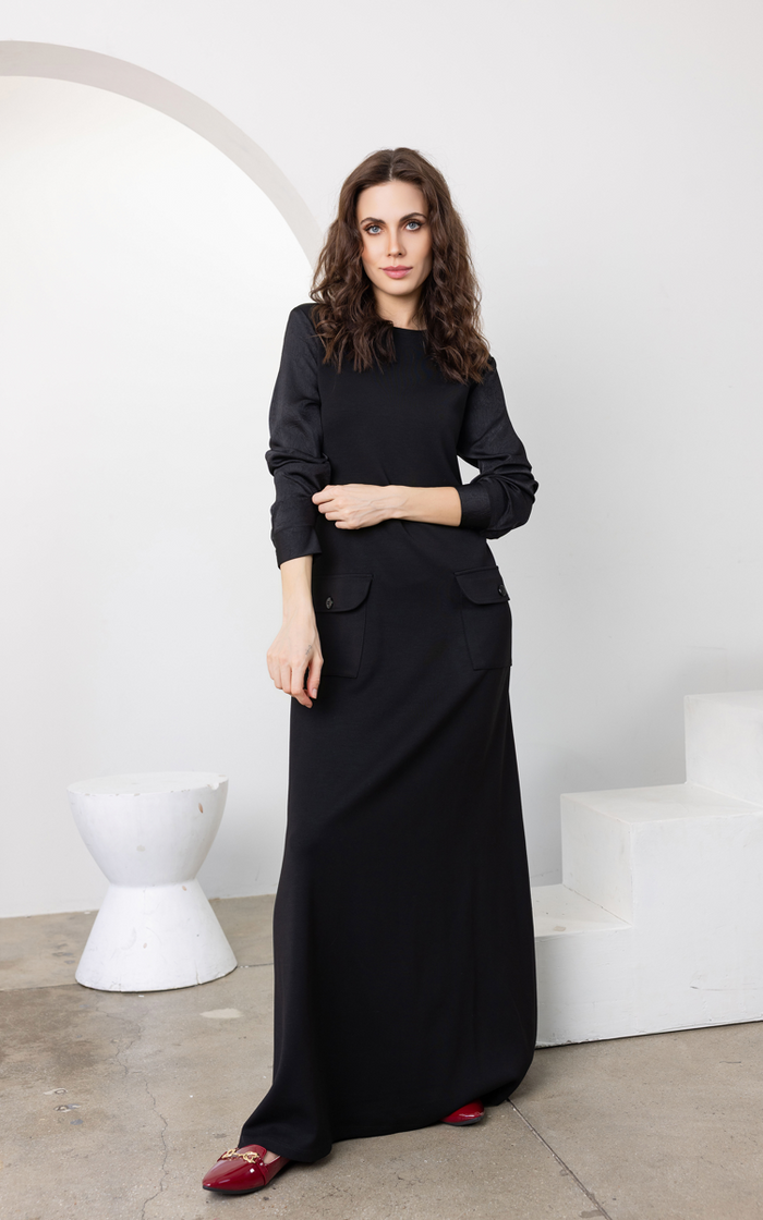 Black long-sleeve maxi dress with crew neck and patch pockets, button details
