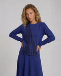 Long sleeve royal blue tee shirt top with black wave screen print motif