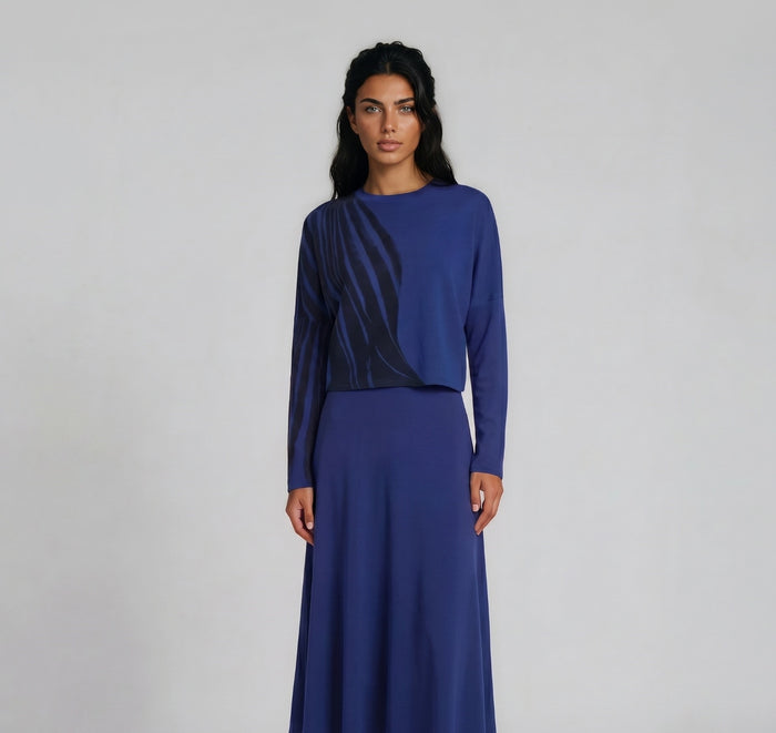 Cropped royal blue tee shirt top with black wave design.