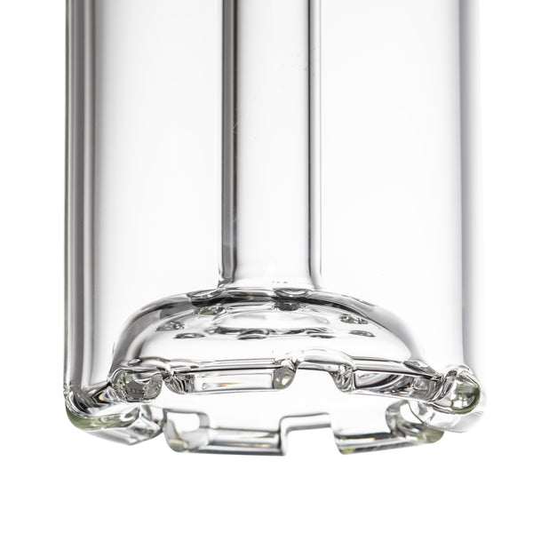 Side profile close-up of thick glass base and raised disc perc inside MJ Arsenal Piston bong, clear borosilicate.