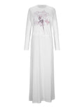 White nursing bolero nightgown with long sleeves and purple floral motif on the bodice