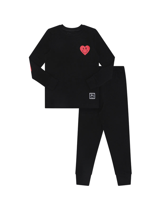 Kids black long-sleeve pajama set with red heart patch, matching pants