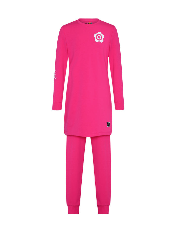 Kids pink tunic pajama set with long sleeves, daisy flower patch and matching leggings