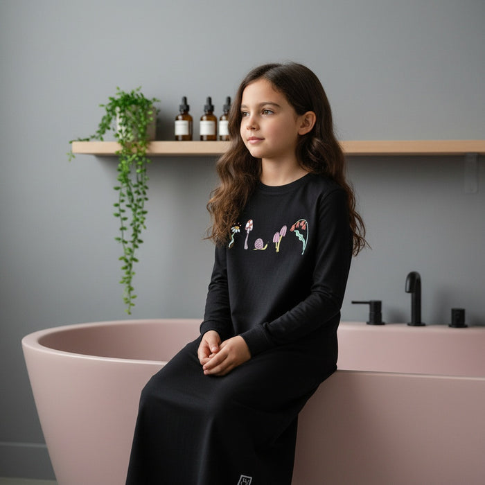 Teen black long-sleeve nightgown with colorful mushroom graphic on chest
