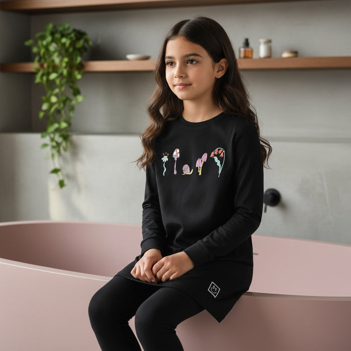 Girls black tunic set with long sleeves, colorful mushroom print, and matching leggings