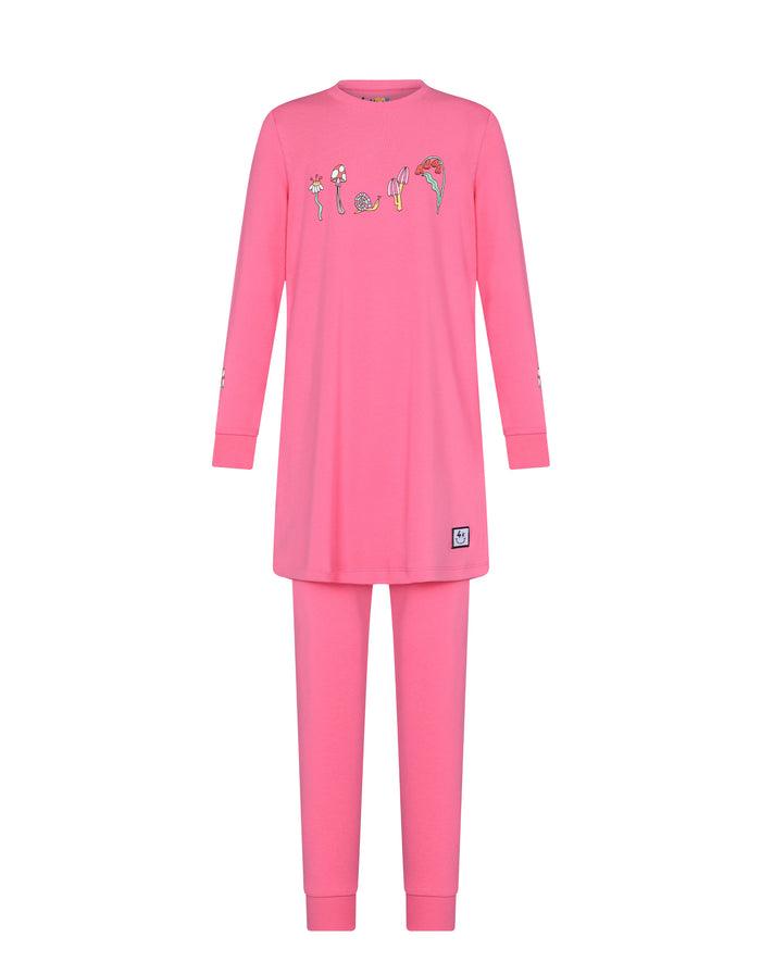 Pink teen tunic and legging set with long sleeves and playful front graphic
